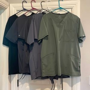 5 pairs of Brand new scrubs!!!